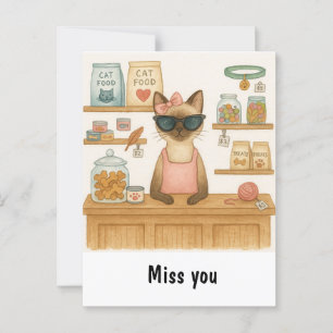 Postal El gato vende comida en la tienda de mascotas
