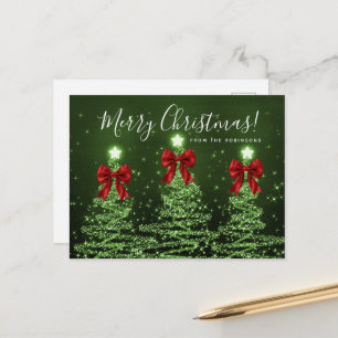 Postal Elegantes árboles de Navidad verdes con lazos rojo