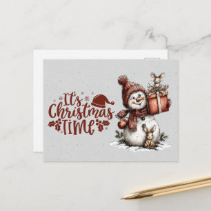 Postal Es Navidad Muñeco de Nieve Sosteniendo Regalo y Ra