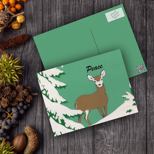 Postal Escena De Invierno De La Nieve De Los Deer De Paz (Brown female deer white face in snow by pine tree on mint green postcard.)