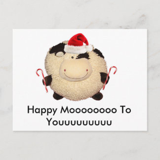 Postal feliz de la tarjeta de Navidad de la vaca
