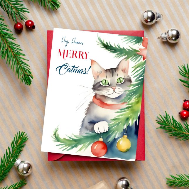 Postal Feliz Navidad a los gatos (Merry catmas Christmas greeting postcard for cat people cute green eyed cat peeping by  tree)