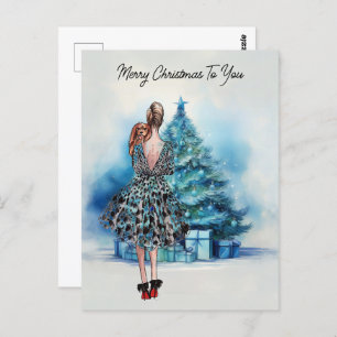 Postal Feliz Navidad mujer y árbol azul de Navidad
