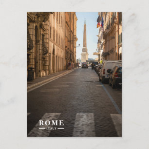 Postal Festiva Calle Empedrada y Obelisco Vista Roma Italia