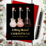 Postal Festiva Con Relieve Metalizado Guitar Merry Navidades musicales negro y oro<br><div class="desc">Los navidades se pusieron geniales y musicales con esta carta festiva personalizada de los amantes de la música de guitarra Navidades musicales alegres. Tres guitarras rústicas de estilo occidental semiacústicas con sombreros de santa completan este divertido diseño único dibujado a mano. Obra original de la artista Catherine Sweetman</div>