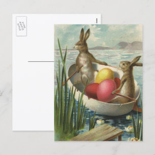 Postal Festiva Conejitos de Pascua antiguos en un barco con huevo