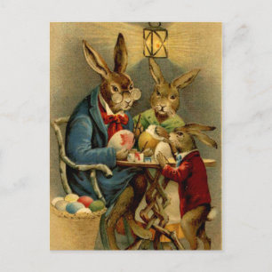 Postal Festiva conejos vintage de Pascua pintando huevos