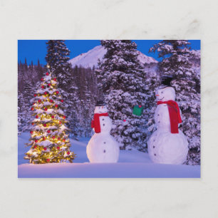 Postal Festiva Dos hombres de nieve intercambian regalos por el 