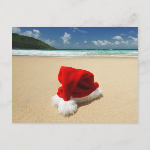 Postal Festiva El gorra de Santa en una playa tropical