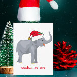Postal Festiva Elefante Santa Cute<br><div class="desc">Los animales vacacionales son mi parte favorita de los Navidades. Un elefante de bonito con un sombrero rojo de Papá Noel y luciendo feliz. Esto me llena del espíritu Navidad. Personalice este regalo con el nombre del destinatario del regalo para un hermoso regalo de Navidades personalizado.</div>