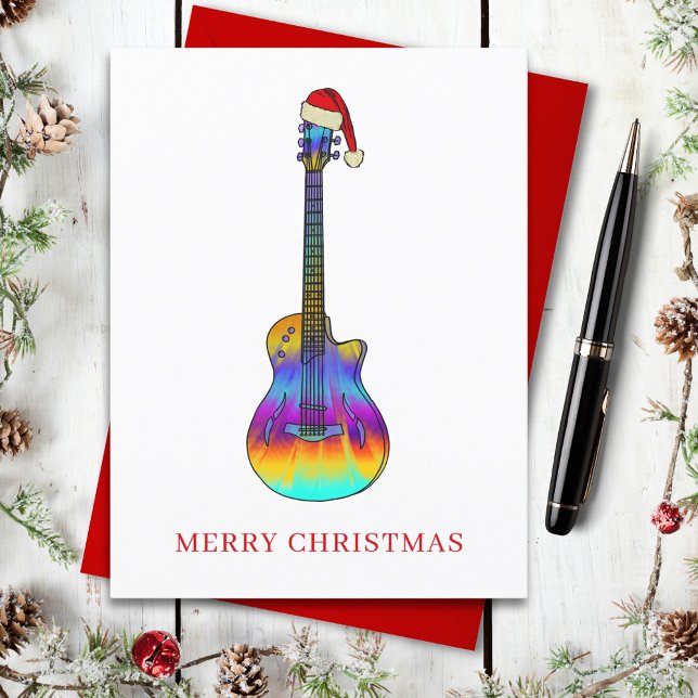 Postal Festiva Feliz Guitarra navideña colorida (Christmas guitar wearing a santa hat holiday greetings postcard )
