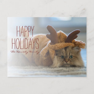 Postal Festiva Gato persa en alfombra con traje de reno