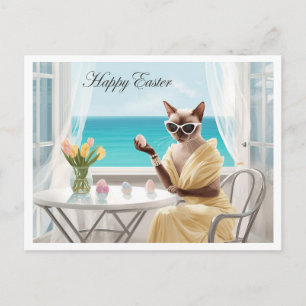Postal Festiva gato siamés de Pascua con huevos en casa junto al 