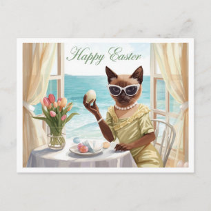 Postal Festiva gato siamés de Pascua con huevos en casa junto al 