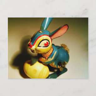 Postal Festiva juguete de conejo y huevo amarillo de pascua