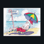 Postal Festiva Navidades del Retro Beach Santa Claus<br><div class="desc">En esta bonita postal, Santa Claus ha cambiado de ubicación. Se relaja en pantalones cortos de surfista rojo en una playa de arena al lado del océano, con un paraguas colorido para la sombra, pero con su característico sombrero Santa. Un bastón de caramelo a rayas tiene un cartel que dice...</div>