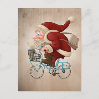 Postal Festiva Papá Noel monta la bicicleta