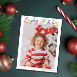 Postal Festiva Ríe todo el camino Navidades de niños arcoiris<br><div class="desc">Hermosa y colorida postal de Navidades de fotos con Laughing All the Way en escritura cursiva de arcoiris bonito. Personaliza con tu fotografía de familia vertical favorita de tu hijo sonriente por encima de tu nombre o saludo personalizado en rojo. Postales divertidas y alegres de vacaciones.</div>