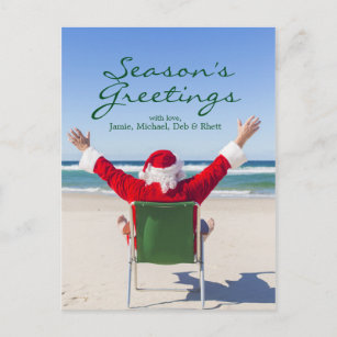 Postal Festiva Santa que se relaja en una playa australiana