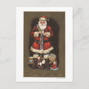 Postal Festiva Santa Stuffing de pie con un cazador de nueces