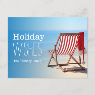 Postal Festiva Sombrero de Papá Noel en una tumbona. Navidades en