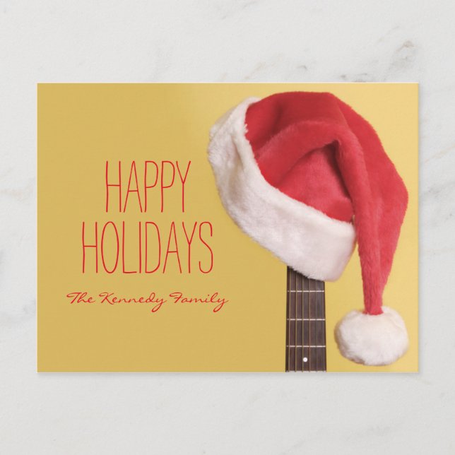 Postal Festiva Un gorra de Santa cuelga en una guitarra acústica (Anverso)
