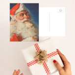 Postal Festiva Vintage Christmas, Santa Claus Naughty Nice List<br><div class="desc">Ilustracion de la Vintage. Imagen de feriado navideño con un alegre Santa Claus usando a su gorra rojo y revisando su traviesa o buena lista en la Noche de los Navidades.</div>