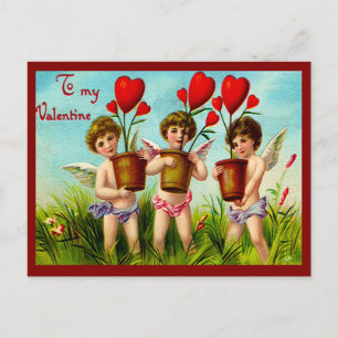 Postal Festiva Vintage Valentine Cupids sosteniendo plantas de co
