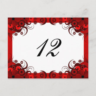 Postal Floral roja en la mesa de recepción blanca Número