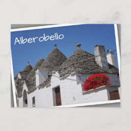 Postal Flores de geranio y casas de trullos en Alberobell
