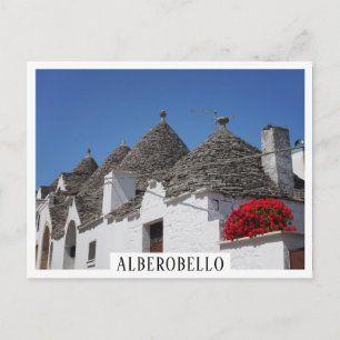 Postal Flores de geranio y casas de trullos en Alberobell