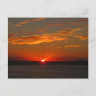 Postal Fotografía de puesta de sol en el océano naranja