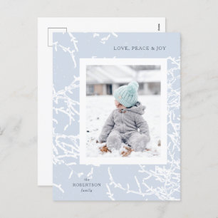 Postal fotográfica de las ramas nevadas azul y bla