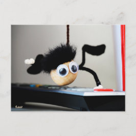 Postal Fubby hangend als de scene van Tom Cruise.