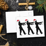Postal Funny Navidades de Santa Qubie<br><div class="desc">Zombis con sombreros de Santa Roja caminando en fila con brazos muertos o estirados frente a ellos. Una increíble postal de Navidades zombies para un fan del horror.</div>