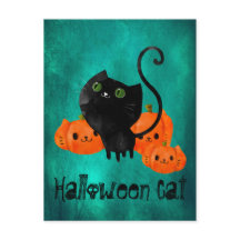 Gato de Halloween con calabazas