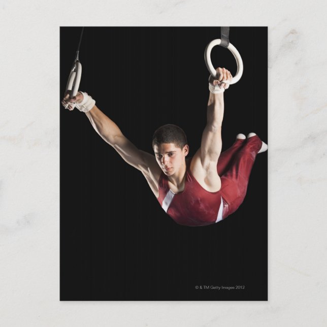 Postal Gimnasta columpiándose de anillas (Anverso)