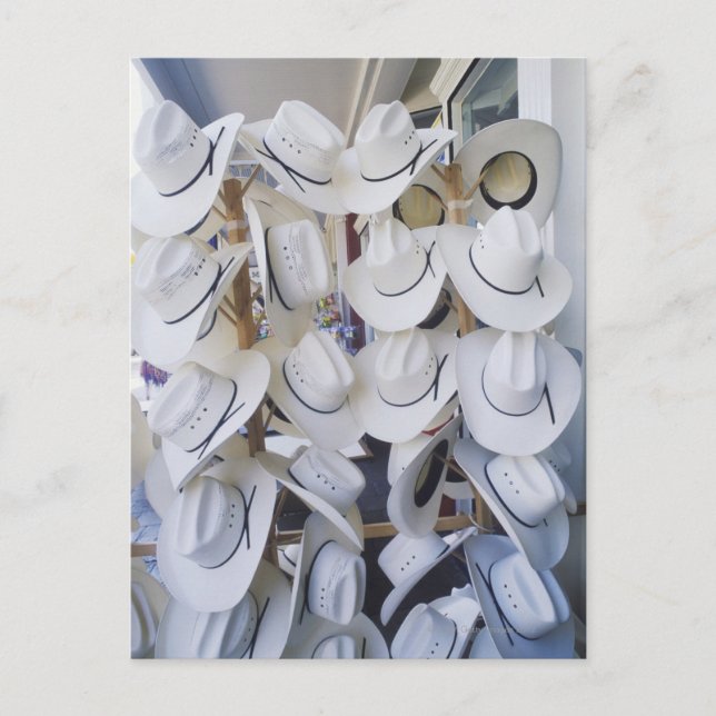 Postal Gorras de Cowboy colgando de una tienda de gorras, (Anverso)