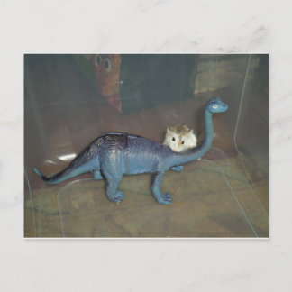 Postal Hámster sobre un dinosaurio