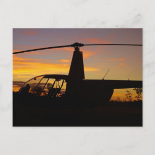 Postal Helicóptero Robinson R44 al atardecer