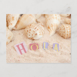 Postal Hola, hello en español en una playa de arena