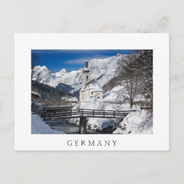 Postal Iglesia en la nieve con los Alpes