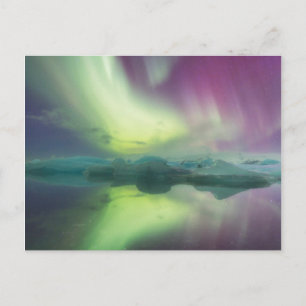 Postal Islandia, Jokulsarlon. Luces de Aurora se reflejan