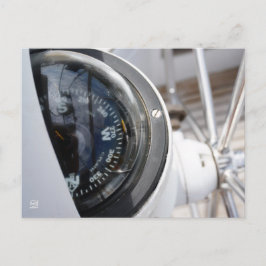 Postal Kompas dat de richting geeft aan een avontuur.