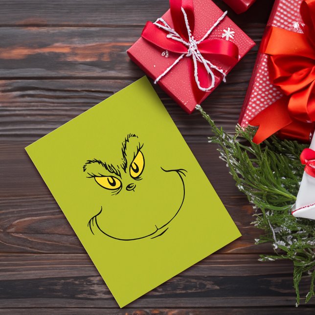 Postal La Cara de Cómo el Grinch Robó la Navidad (Card on table)