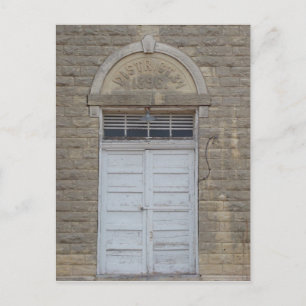 Postal La puerta de la escuela