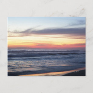 Postal La puesta de sol en la playa