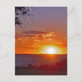 Postal La puesta de sol romántica en el océano