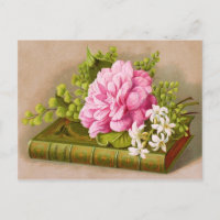Libro de cumpleaños antiguo con flores rosas