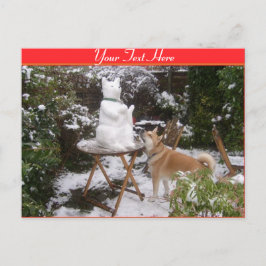 Postal lindo perro con muñeco de nieve en los navidades